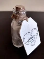 A Feather From An Angel, Feather in Corked Glass Bottle