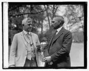 Photo:Dr. Clifford N. Collins (left)