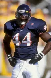Linebacker Wali Rainer Virginia Cavaliers looks on during the - 1998 Old Photo