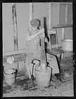 Photo:Lumberjack washing clothes at logging camp near Effie, Minnesota