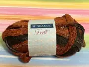 one new skein Sundance Frill yarn orange brown