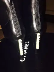 Chanel black leather booties w/ pearls and peep toe tip, 38.5. $1,300