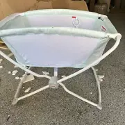 ​​Fisher-Price Rock with Me Bassinet Pacific Pebble Travel Baby Crib Rocking Mot