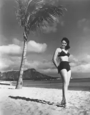 Donna Reed posing on a beach overlooking Diamond Head Oahu Hawaii - Old Photo