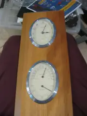 Bulova NOS Quartz clock with Hygrometer and thermometer, wood with silver bezels