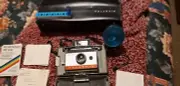 COLLECTORS ITEM Polaroid Automatic 104 land Camera.Its NEW COND. LEATHER CASE!