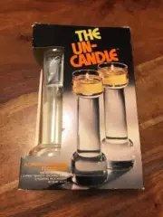VINTAGE THE UN-CANDLE VINTAGE FLOATING 9" CANDLE SET BY CORNING PYREX (JL)