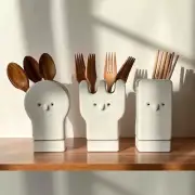 Ceramic spoon, fork, chopstick holder with water base.