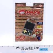 Mario's Cement Factory 2002 MGA Electronic Handheld Game Mini Classics Keychain