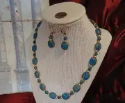 Hand-crafted artisanal necklace/earring set in moondust blue with Picasso finish