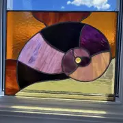 Kari Greenberg Klenna Colorado Artist Stained Glass Panel Window Snail Shell