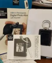 The Sharper Image 1.4” Digital Photo Album w/Keychain USB 2.0 Rechargeable NEW