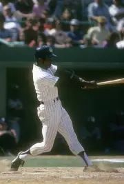 Paul Blair New York Yankees swings at a pitch at a spring training- Old Photo