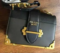 在飛比找旋轉拍賣優惠-保證全新正品PRADA Cahier 黑金 寬背帶 風琴包 