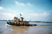 The tugboat Orleans moves out to sea in New Orleans Louisiana 1957 Old Photo