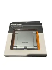 NIB Brookstone Flip Calculator With World Clock, Calendar and Alarm Metal Grey