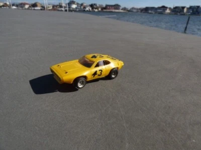 AFX AURORA 43 YELLOW PLYMOUTH ROAD RUNNER STOCK HO SLOT CAR N O S MINT
