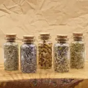 Sage, Herbs, and Flowers in Glass Apothecary Jars – Set of 5 Glass Bottles