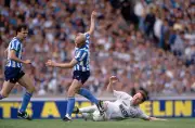 Clive Allen of Tottenham Hotspur slides in to tackle Greg Downs o - Old Photo