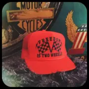 Freedom Is Two Wheels adjustable orange trucker cap w checkered flags chopper