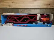 VTG New In Box! Ertl Pressed Steel Car Carrier With Pontiac Firebird