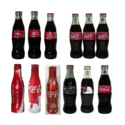 Coca cola Collectible Christmas Bottles, full and unopened