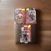 WWE Wrestler Collectors Figurines Set of 3 Roman Reigns John Cena Undertaker