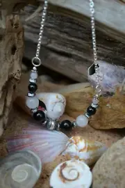 Handmade necklace with Sterling Silver, White Jade & Black Onyx.