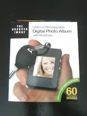 NEW THE SHARPER IMAGE DIGITAL PHOTO ALBUM W/KEYCHAIN