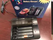 Battery Charger for 9V, AAA, AA Ni-MH, Ni-Cd Holds 8 cells.
