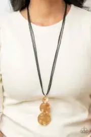 Paparazzi's "Circulating Shimmer" Black & Gold Necklace Set