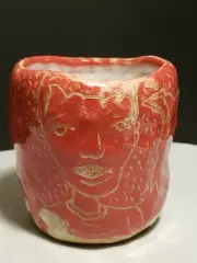 sculpture by artist Benjie Heu , mug, cup 4 faces signed on the bottom.