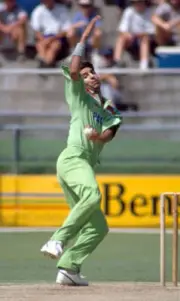 Wasim Akram bowling for Pakistan during the World Cup match b- Old Cricket Photo