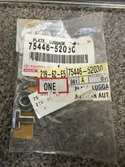 2002-2005 Toyota Echo Plate ,Luggage Compartement Door Name OEM 75446-52030 /3-C