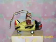 EMMETT KELLY JR "YELLOW PLANE" HANGING ORNAMENT FLAMBRO