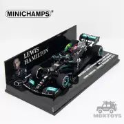 MINICHAMPS 1:43 2021 F1 MB PETRONAS W12 E No44 L.HAMILTON 1ST BRAZILIAN W/FLAG