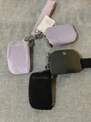 Lululemon dual pouch wristlet bundle of 2 Black and lavender Brand New