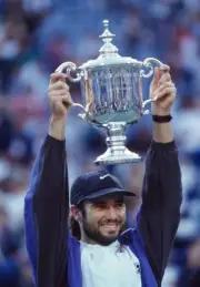 Andre Agassi USA lifts the trophy after defeating Michael Stich of- Old Photo 1
