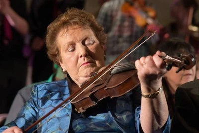 Verona Ryan performing playing the fiddle Fleadh Gathering concert- Old Photo