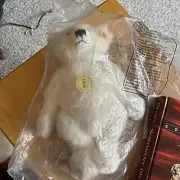 Steiff classic white teddy bear number 030451 and is 10 inches tall. New