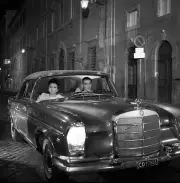 Joan Collins and Vittorio Gassman driving a Mercedes in Hard Times- Old Photo