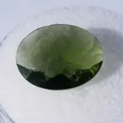 Authentic natural faceted Moldavite 3.20 carats oval shaped about 13x10x4mm