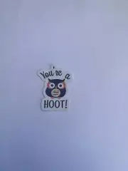 Add a touch of whimsy to your belongings with our "You're a Hoot" owl sticker!