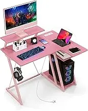 Giantex L-Shaped Gaming Desk with Outlets & USB Ports, Small Computer Desk with Monitor Shelf, Headphone Hook, Storage Shelf & Host Stand, Corner Gamer Desk with Carbon Fiber Texture (Pink)