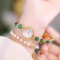 在飛比找Yahoo!奇摩拍賣優惠-中古輕奢珠孔雀石表女手錶