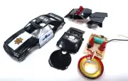 Tyco #56 police car light and sound unassembled for customization. 2 options .