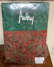 Audrey Christmas Red Green Poinsettia Jacquard Tablecloth 60 x 84 Oval