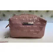 Betsey Johnson embossed patent travel/cosmetic bag in blush pink. NWT.