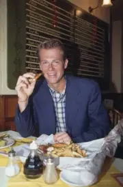 Swedish tennis player Stefan Edberg eating fish chips in newspaper- Old Photo