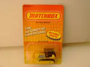 1987 MATCHBOX SUPERFAST MB 64 CATERPILLAR BULLDOZER BLACK TOP NEW ON CARD
